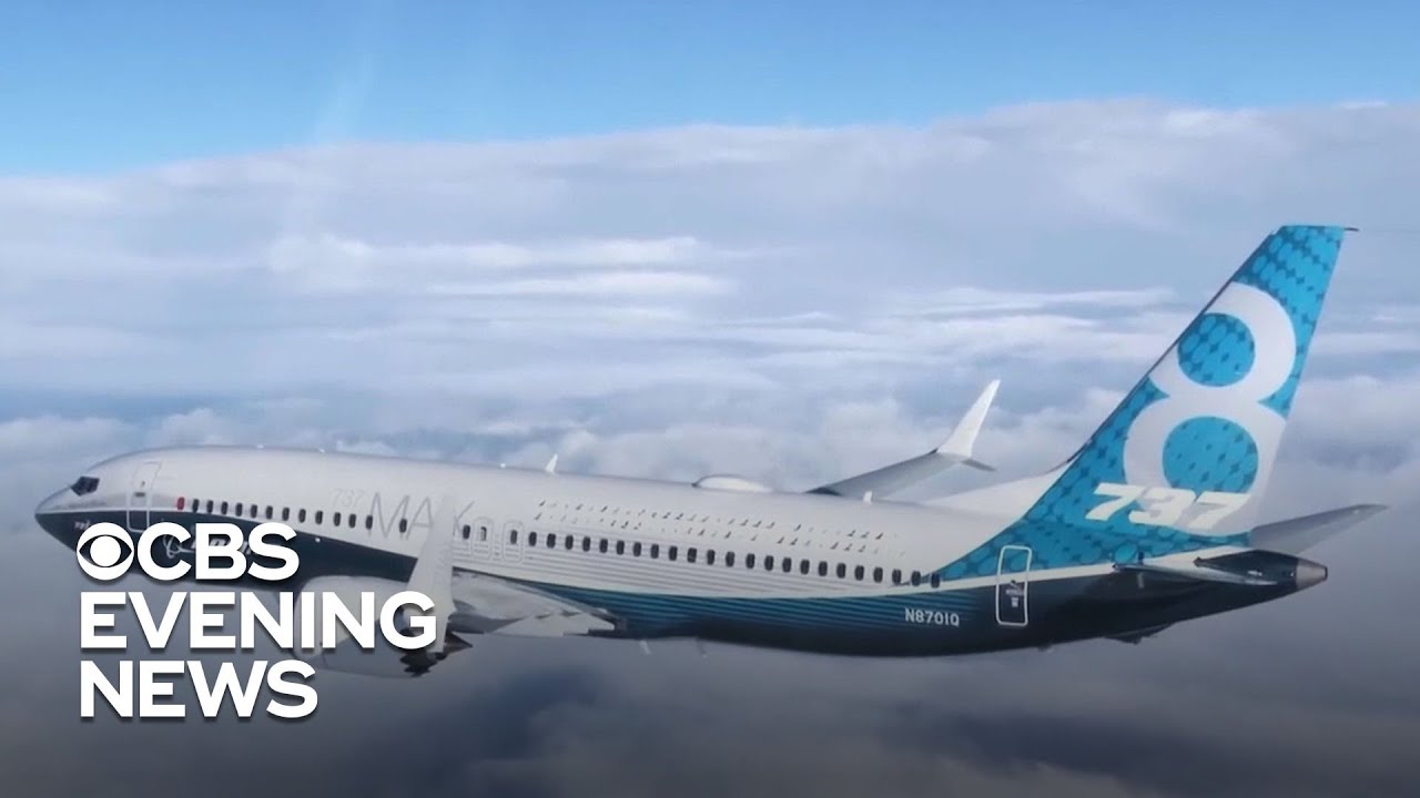Boeing cutting production of grounded 737 Max jets - YouTube