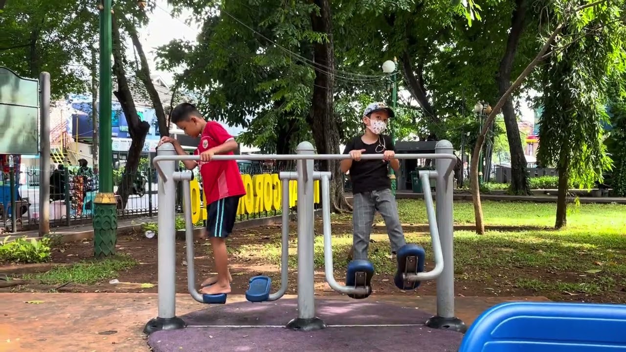 watching kids playing in the park 