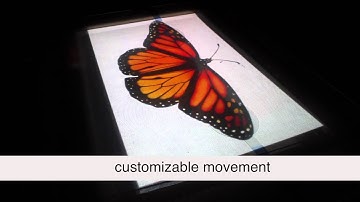 TableHop: An Actuated Fabric Display Using Transparent Electrodes