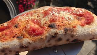 Hello! we made a calzone using the roccbox gozney pizza oven with
tomato sauce, summer truffle salami black pepper, buffalo mozzarella
and grated m...