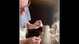 Mark Hewitt putting lug handles on a vase at the Mark Hewitt Pottery