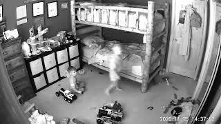 Boy falls from top bunk bed as brother attempts to give him toy