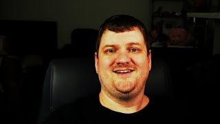 Guy Sits In Front Of A Camera