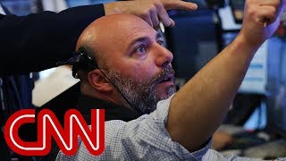Dow tumbles on Italy fears and US-China trade tensions