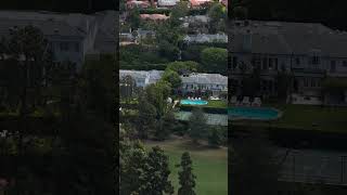 Affluent residential district with luxury mansions and golf course in Los Angeles, exclusive