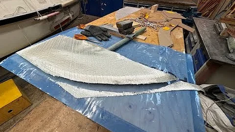 Laminating starbord side of deck house and rudder.