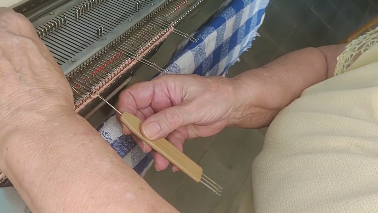 Casinha de botão na máquina 