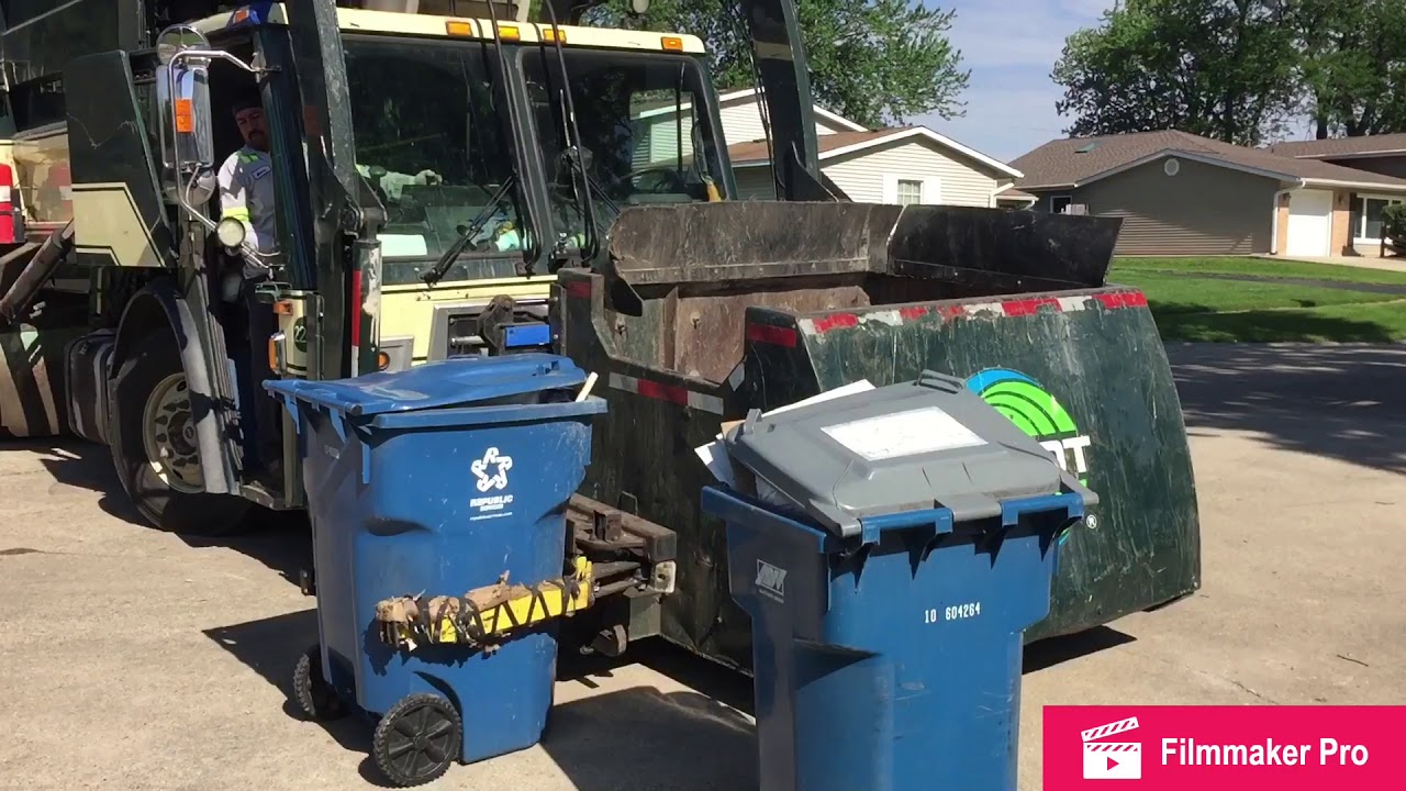 Groot McNeilus front loader on garbage