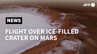 Mars's ice-filled crater 'Korolev' seen in video animation | AFP