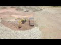 Earthmoving + Caterpillar excavadora 320D2L + volquete hyundai + drone dji mavic pro