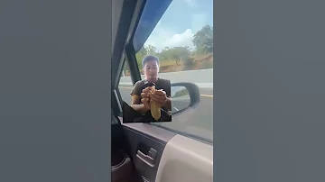 Eating Corn On The Car Dashboard 