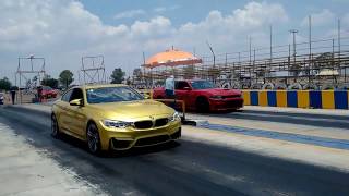 BMW M4 VS Charger Hellcat