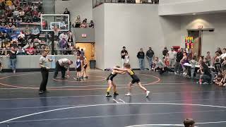 Lyla Moos wins 7 to 4 against a boy keeps him from the Iowa State Tournament.