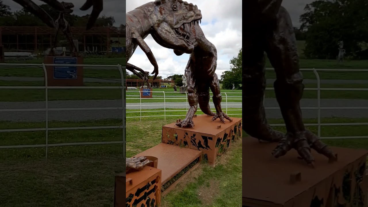Fighting Dinosaurs -  Tyrannosaurus scrap metal sculpture at The Ironworks, Oswestry, Shropshire, UK