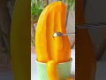 Scooping fresh orange mangoes with a special tool #shorts