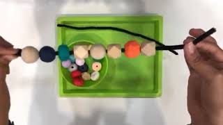 Peekaboo Presents Threading Beads