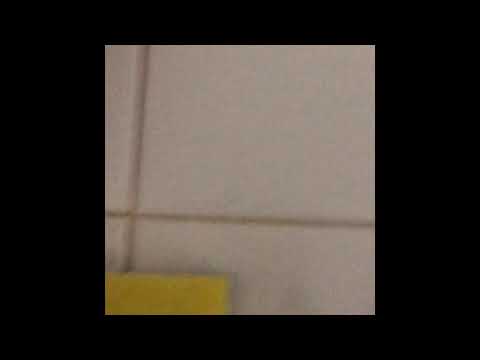 How to remove grout from tile counter top