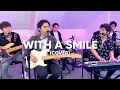 With a smile cover  the juans