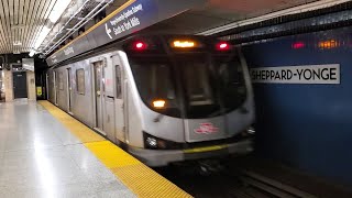 TTC TR Subway Train arriving and departing Sheppard-Yonge Station (Line 1)