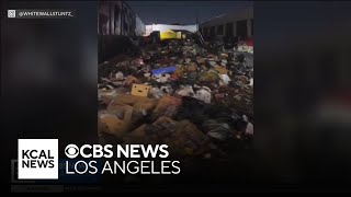 Pallets of fruit being dumped on downtown Los Angeles streets