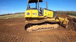 Cutting in a building pad and driveway with the dozer