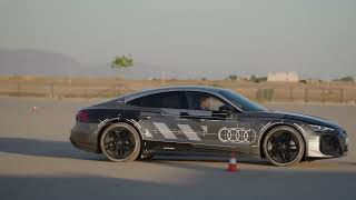 The new Audi e-tron GT prototype black camouflage wrap Handling course