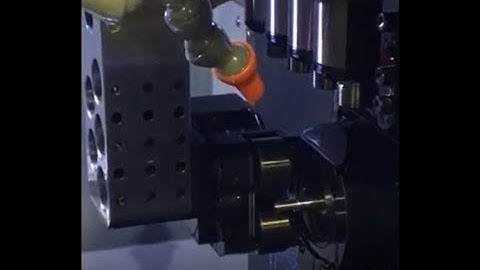 LMT FETTE T160F rolling head on Swiss CNC lathe running 10-32 thread  in less than 1 second.