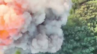 Ukraine - XX.08.2023. AFU Drone Drops An M67 Hand Grenade On A Russian Field Ammunition Stockpile.