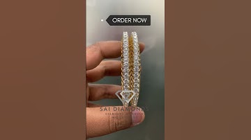 Elegance in every sparkle! This stunning 30-pointer diamond bangle is pure sophistication. 💎