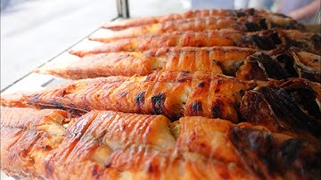 Vietnamese street food/ grilled snakehead fish with five spices/ xe cá lóc nướng ngũ vị vàng ươm