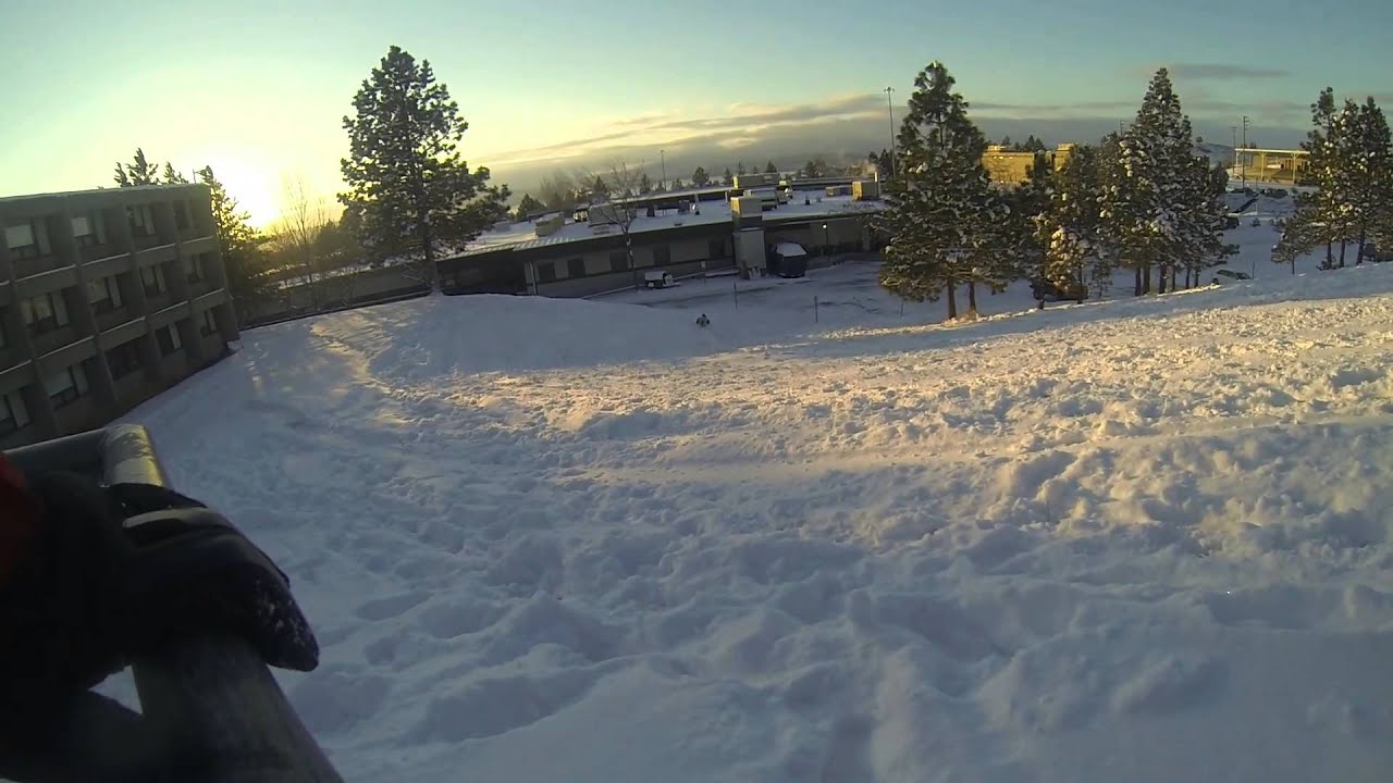 Oregon Tech Klamath Falls students sledding down by the Res Hall Saturday 1