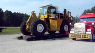 The Crew of Triple Nickel unload another Chip Dozer