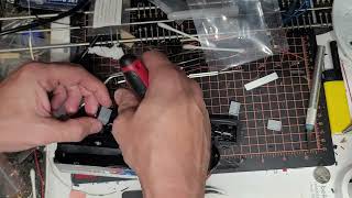 Installing a Soundtraxx Econami DCC sound decoder in a Athearn Roundhouse Amtrak locomotive.