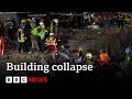 Dozens still trapped in South Africa building collapse | BBC News