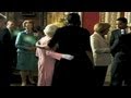 First lady's surprising hug from the Queen of England