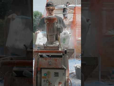 Spraying adhesive basecoat in preparation for Silicone Render #construction ￼