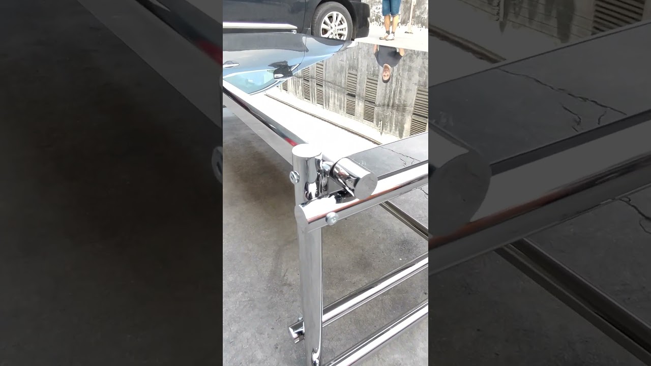 Industrial-Style Mirrored Stainless Steel Table Design 