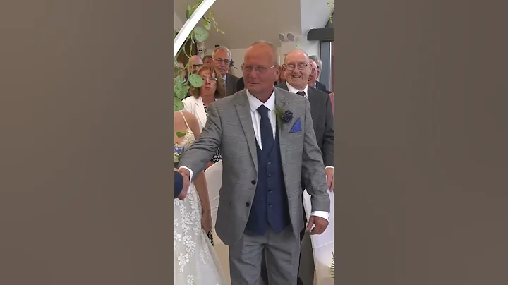 Bride Walks Up The Aisle With Her Father