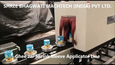 Empty Ghee Jar Shrink Sleeve Applicator Tunnel Line