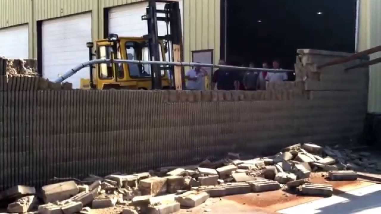 Forklift Driver knocks down entire wall YouTube