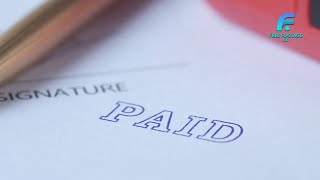 Paid invoice and rubber stamp | 4K Footage