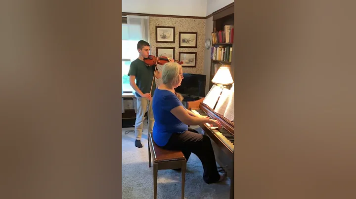 Lucas playing his violin May 2022