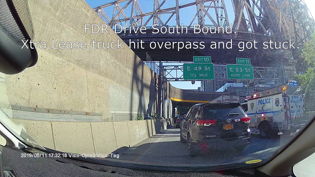 Driving in New York City, NYC - Xtra Lease truck hit overpass and got stuck..