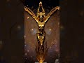 Annunaki with arm r aised towards a star filled sky, embracedwith shining cosmic energy#awaken