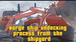 Barge ship undocking process from the shipyard