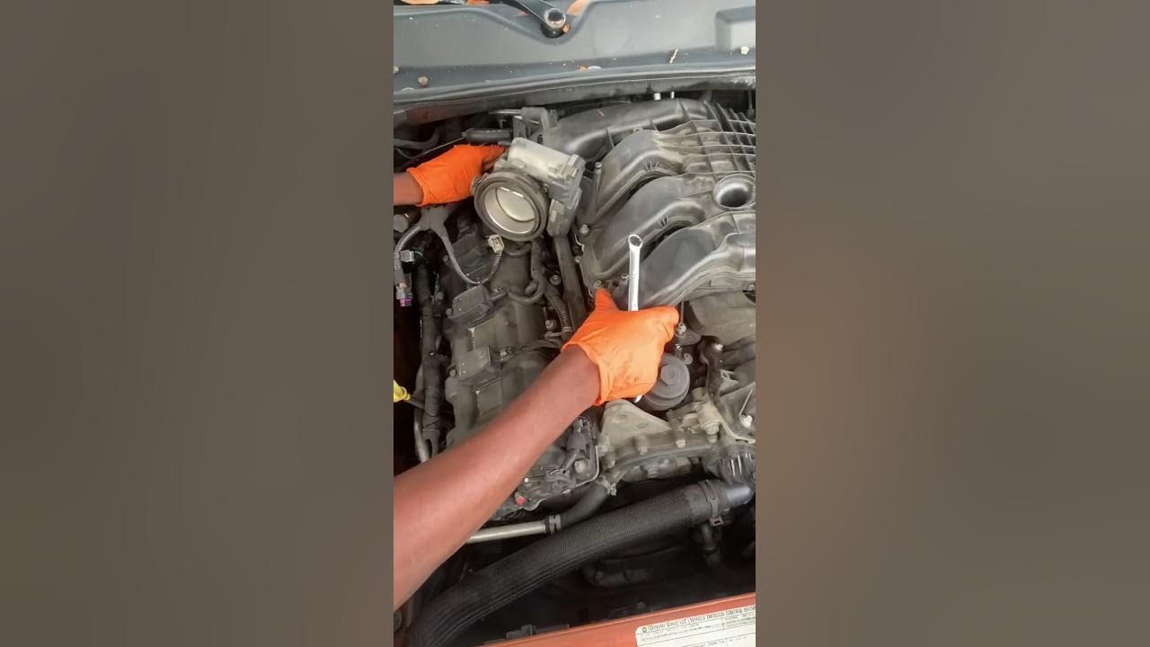 2011 dodge Challenger oil cooler removal - YouTube