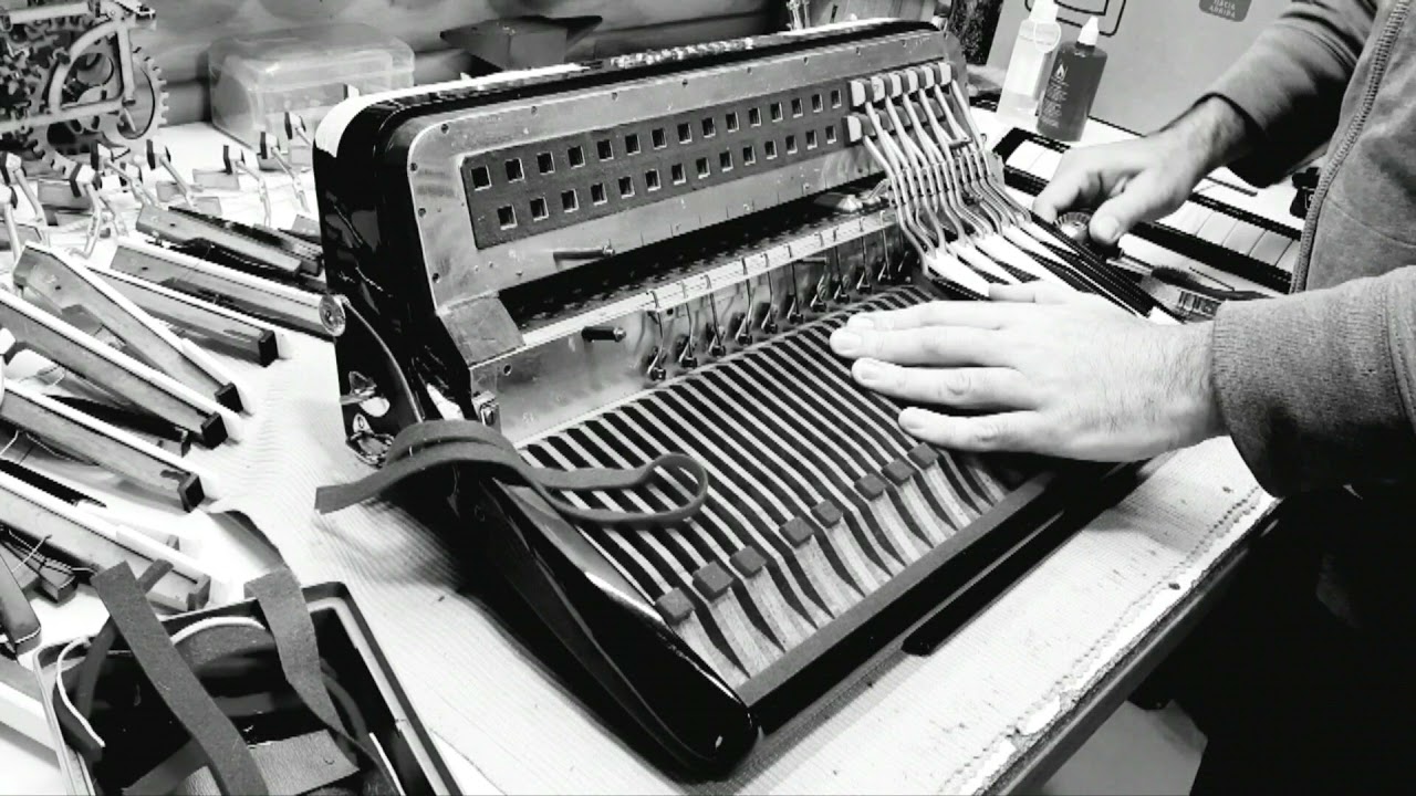 Assembling the keyboard on a Dallapé Organtone II double chamber accordion
