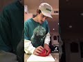 A guy cutting a pepper being hot for no reason