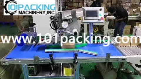 Automatic small carton box pushing down top flat surface labeling machine running video