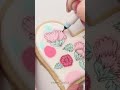 I made floral cookies for Valentine’s Day with royal icing and an edible ink marker